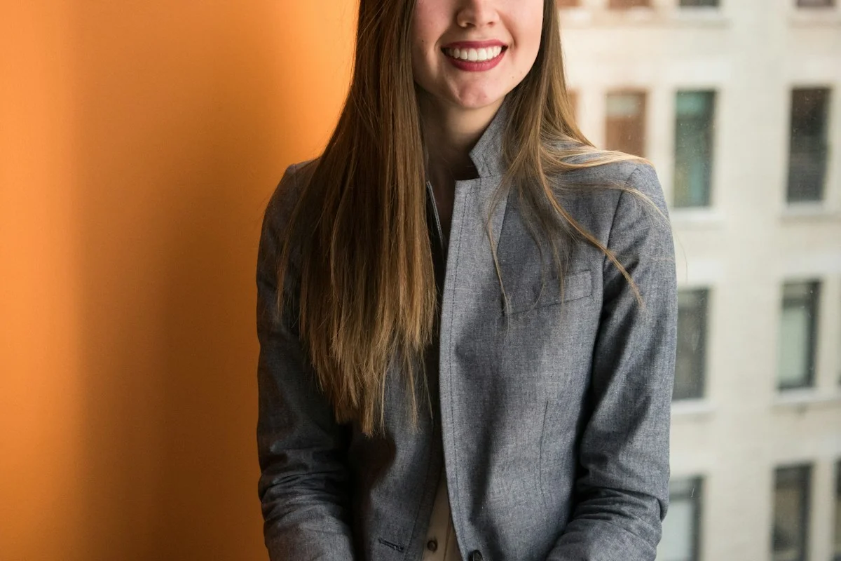 Illustrative portrait of a woman in a bright workspace